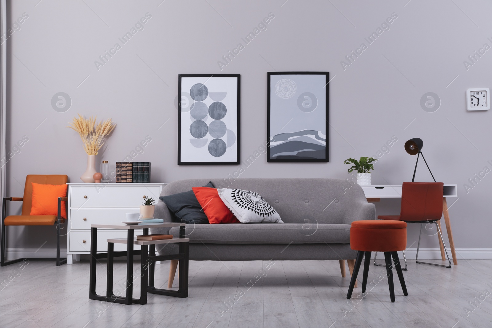 Photo of Stylish grey living room interior with comfortable sofa