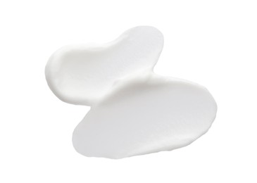 Samples of face cream on white background
