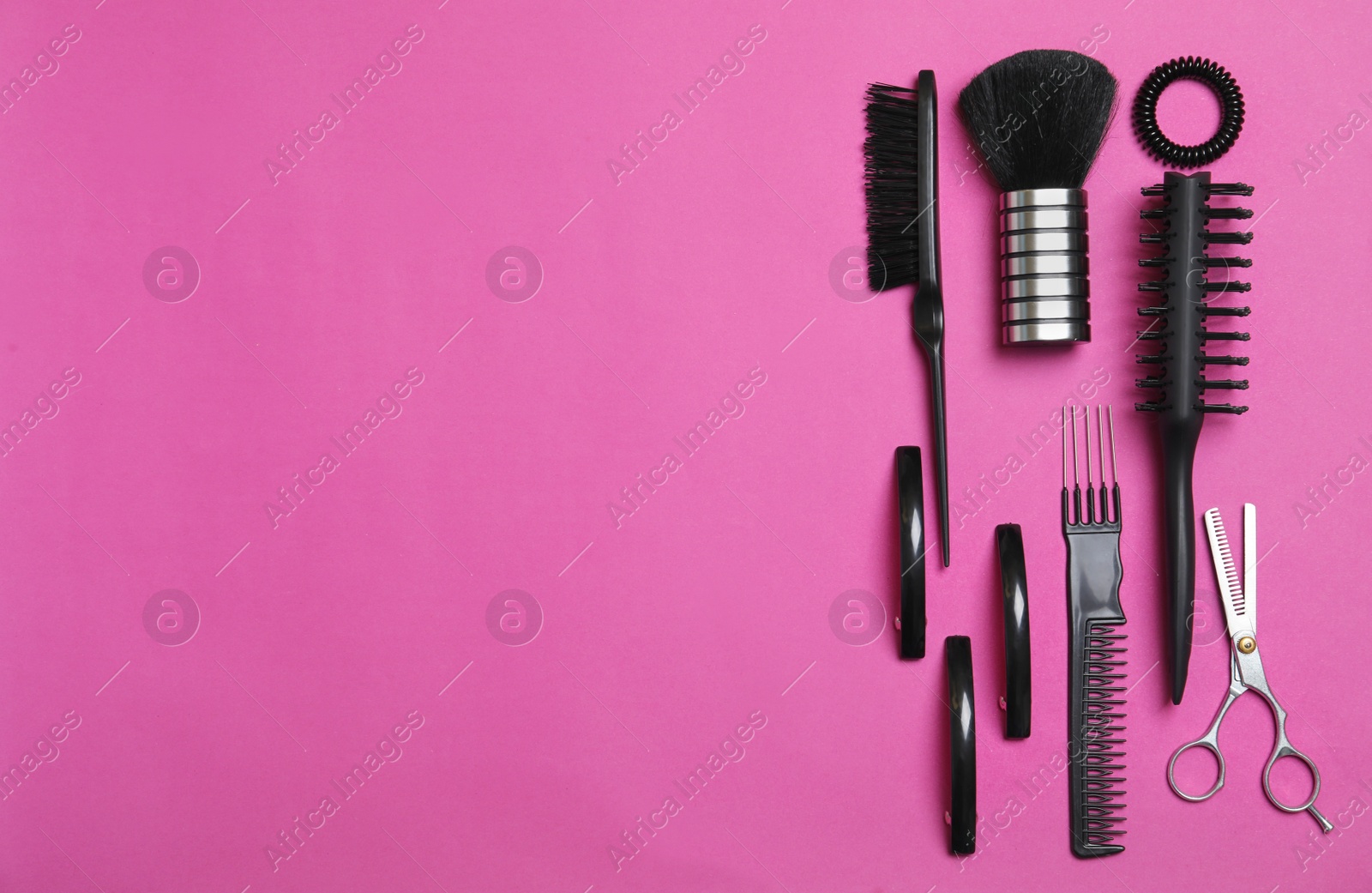 Photo of Professional hairdresser set on color background