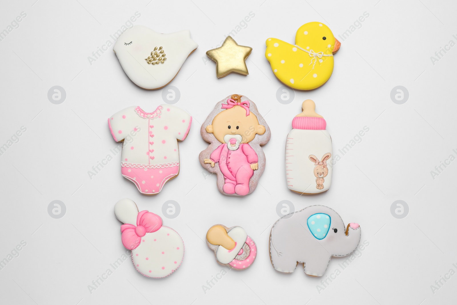 Photo of Set of baby shower cookies on light background, flat lay