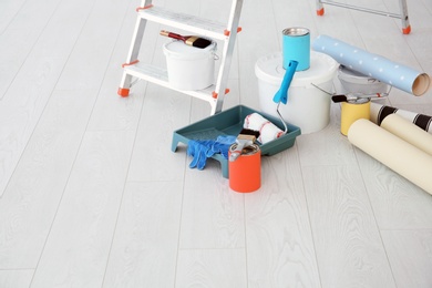 Step ladder and decorator's tools in light room