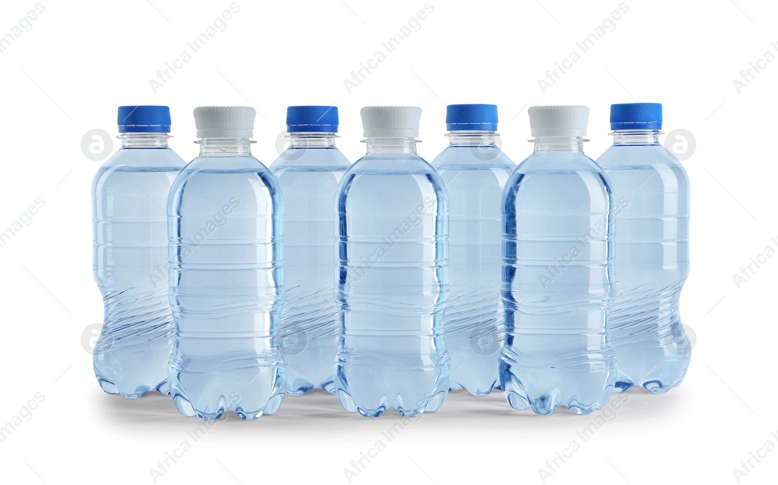 Photo of Set of different plastic bottles with water on white background