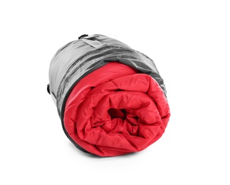 Photo of Rolled sleeping bag on white background. Camping equipment