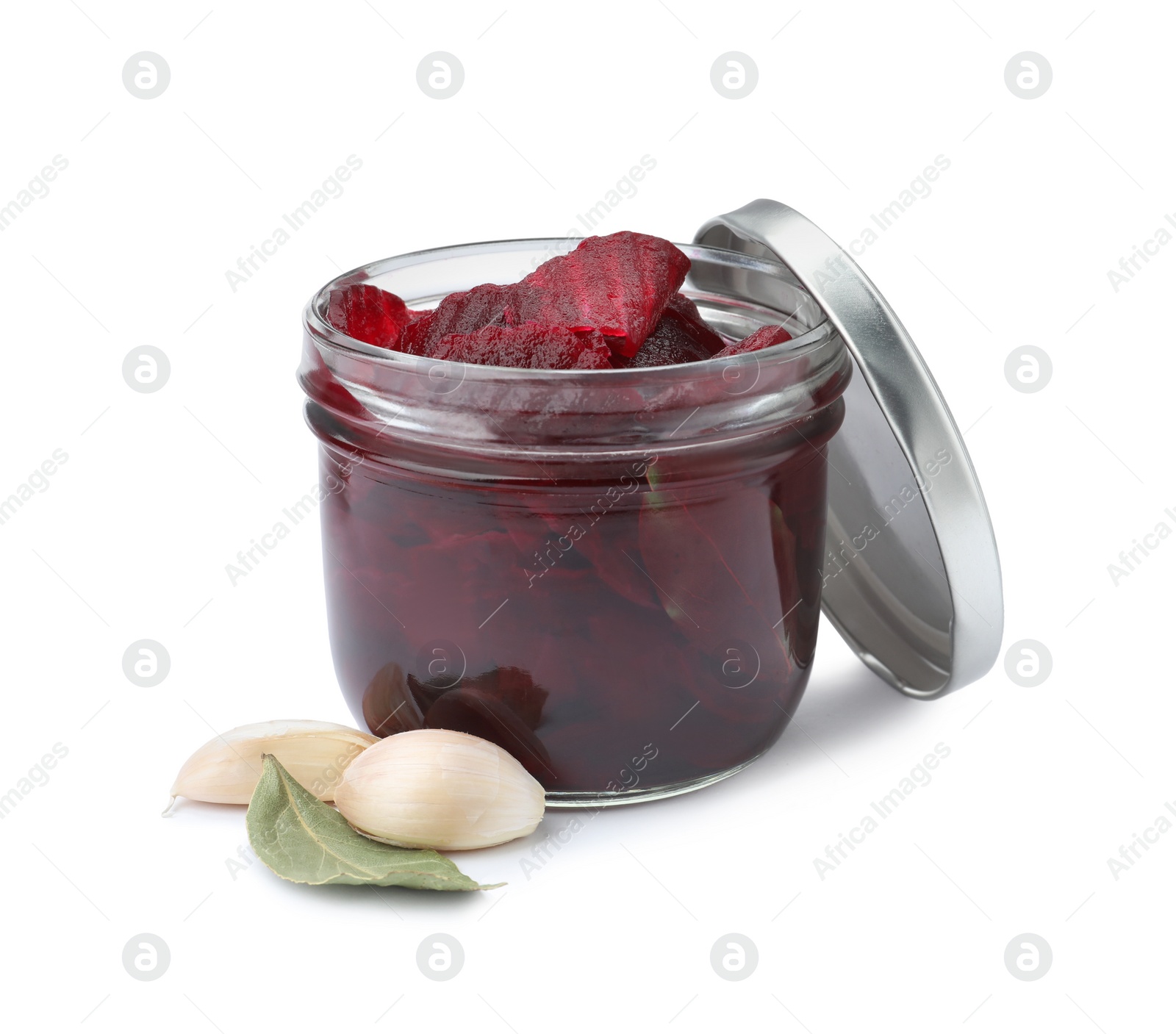 Photo of Pickled beets in jar and garlic isolated on white