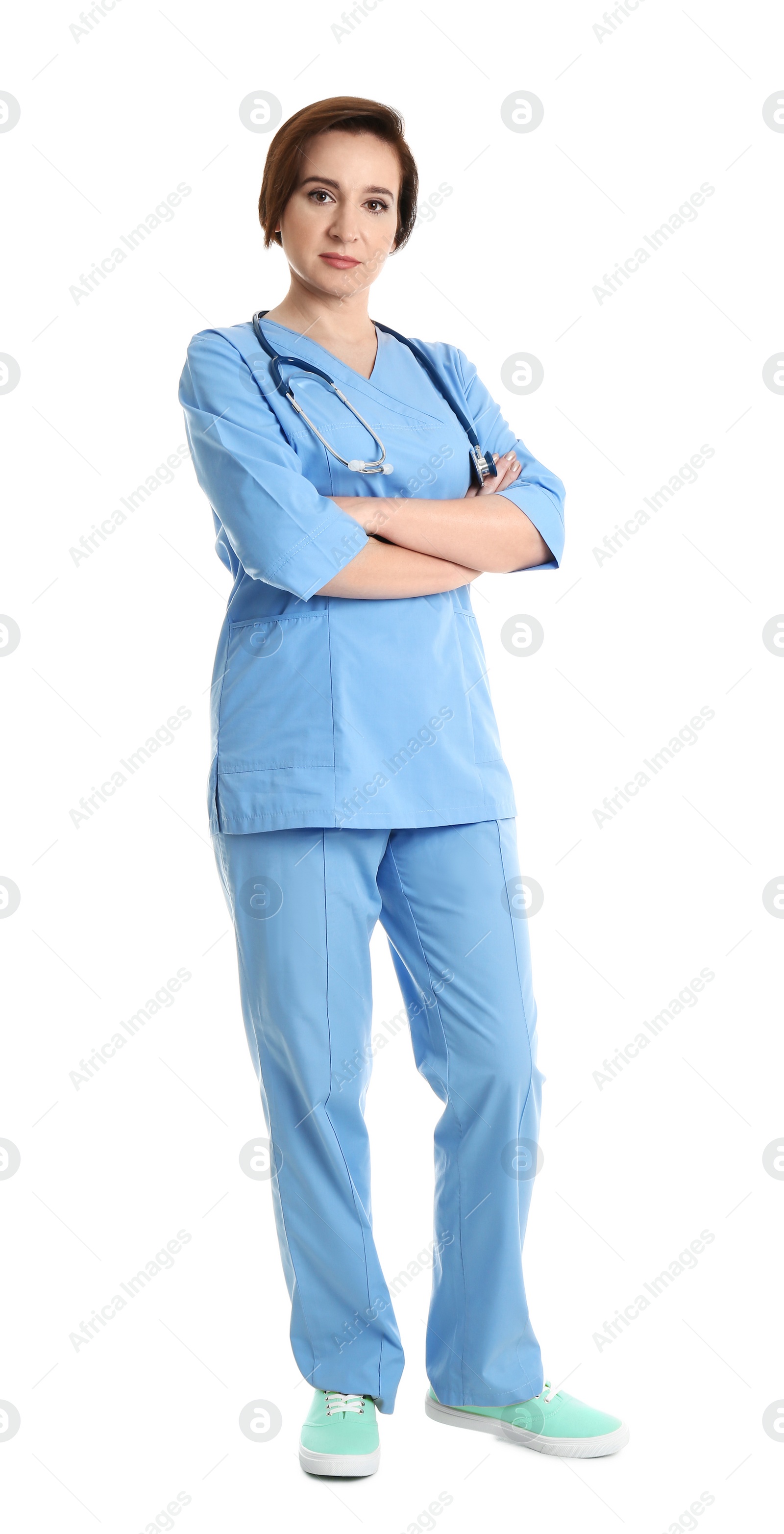 Photo of Full length portrait of experienced doctor in uniform on white background. Medical service