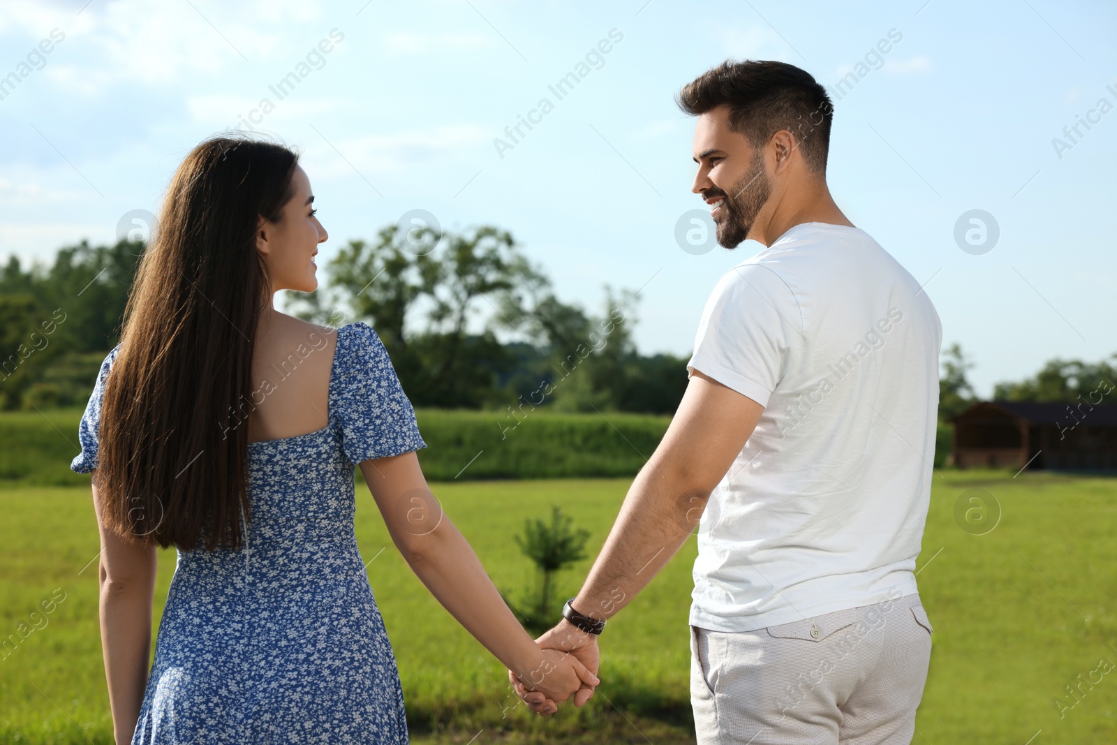 Photo of Romantic date. Beautiful couple spending time together outdoors