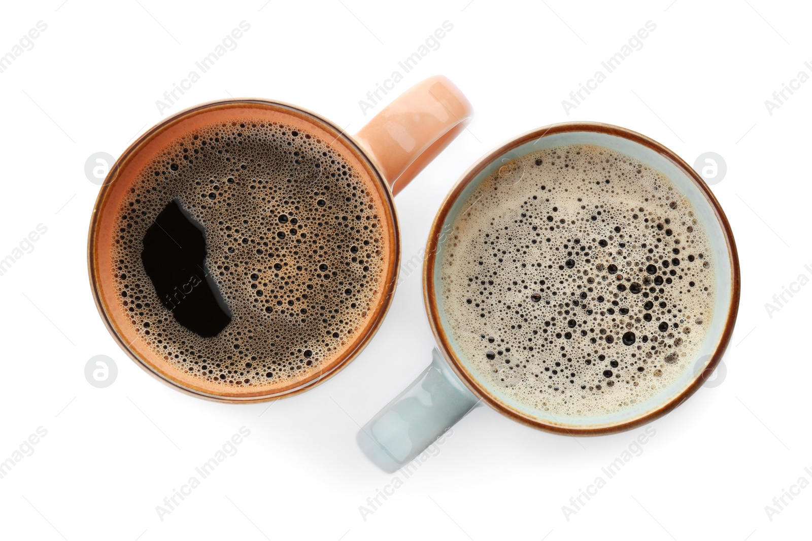 Photo of Cups with delicious hot coffee on white background