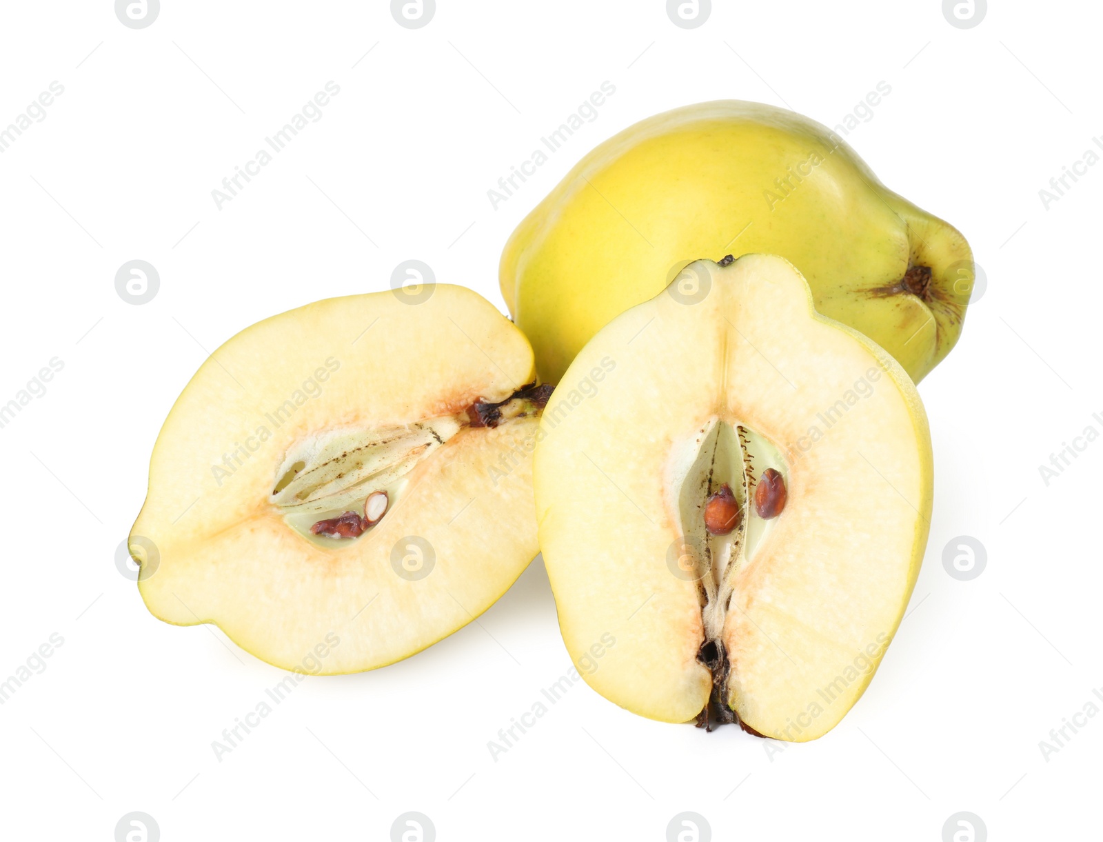 Photo of Ripe whole and cut quinces isolated on white