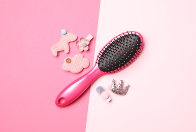 Photo of Flat lay composition with hair brush on color background