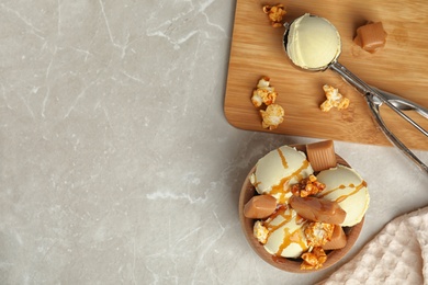 Photo of Flat lay composition with delicious ice cream on table. Space for text