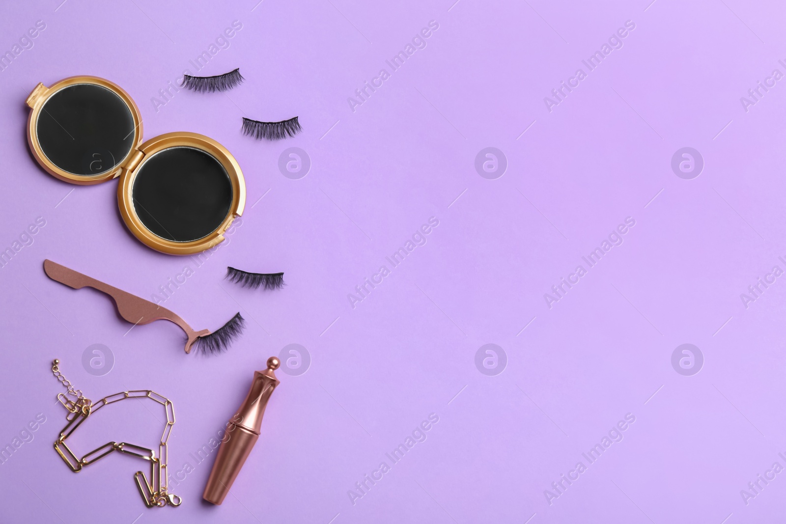 Photo of Flat lay composition with magnetic eyelashes and accessories on violet background. Space for text
