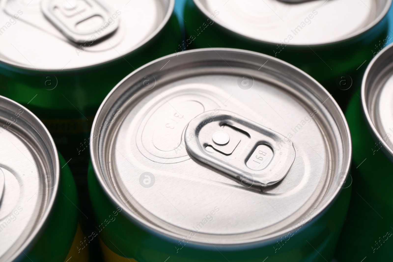 Photo of Energy drink in cans, closeup. Functional beverage