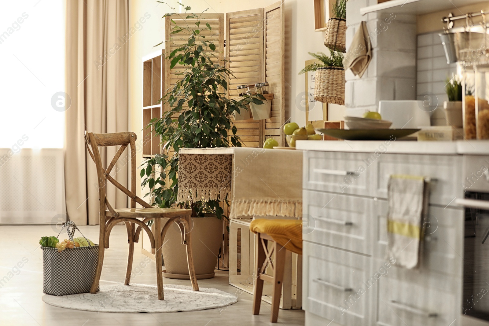 Photo of Modern kitchen interior with wooden crates as eco furniture