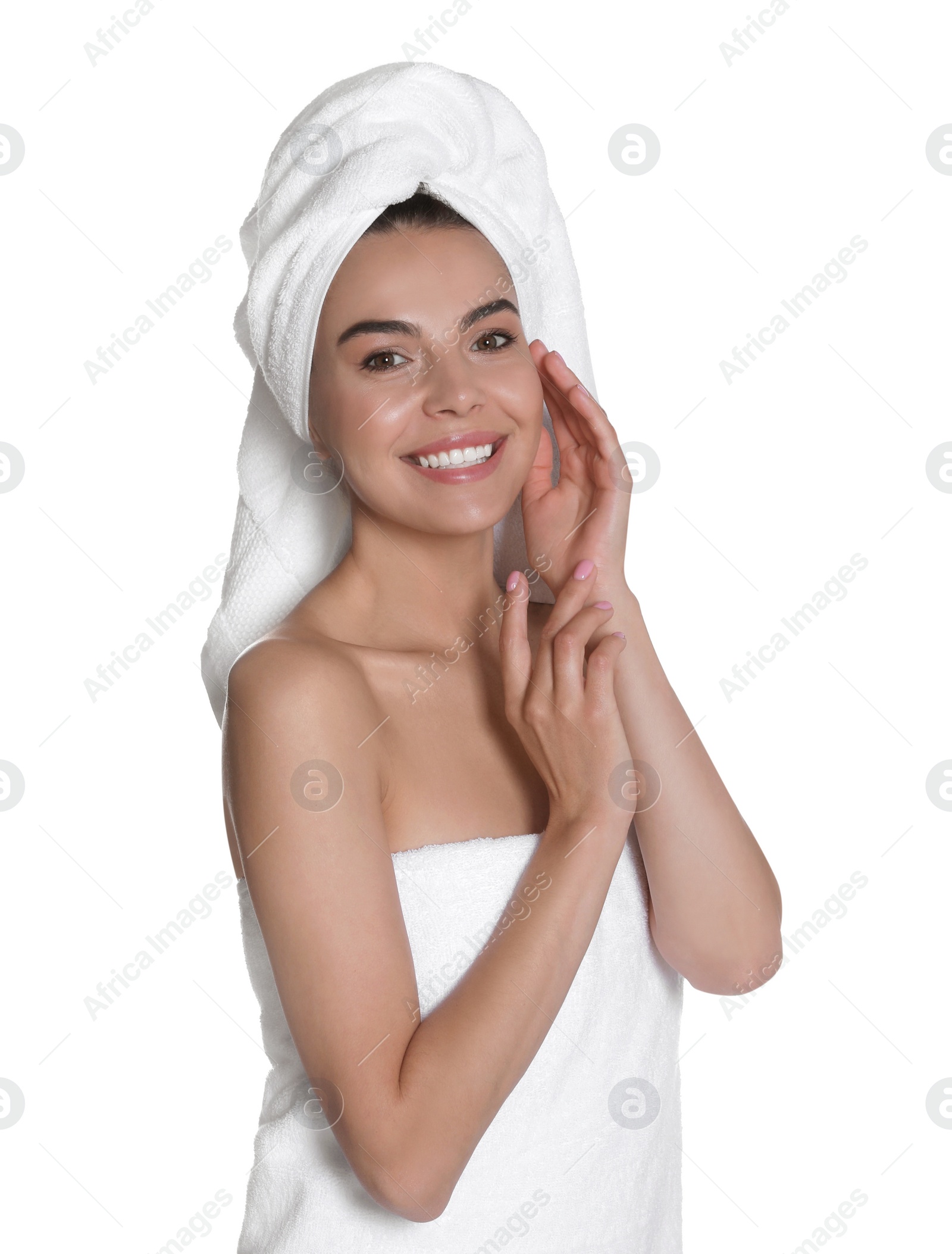 Photo of Beautiful young woman with towels on white background