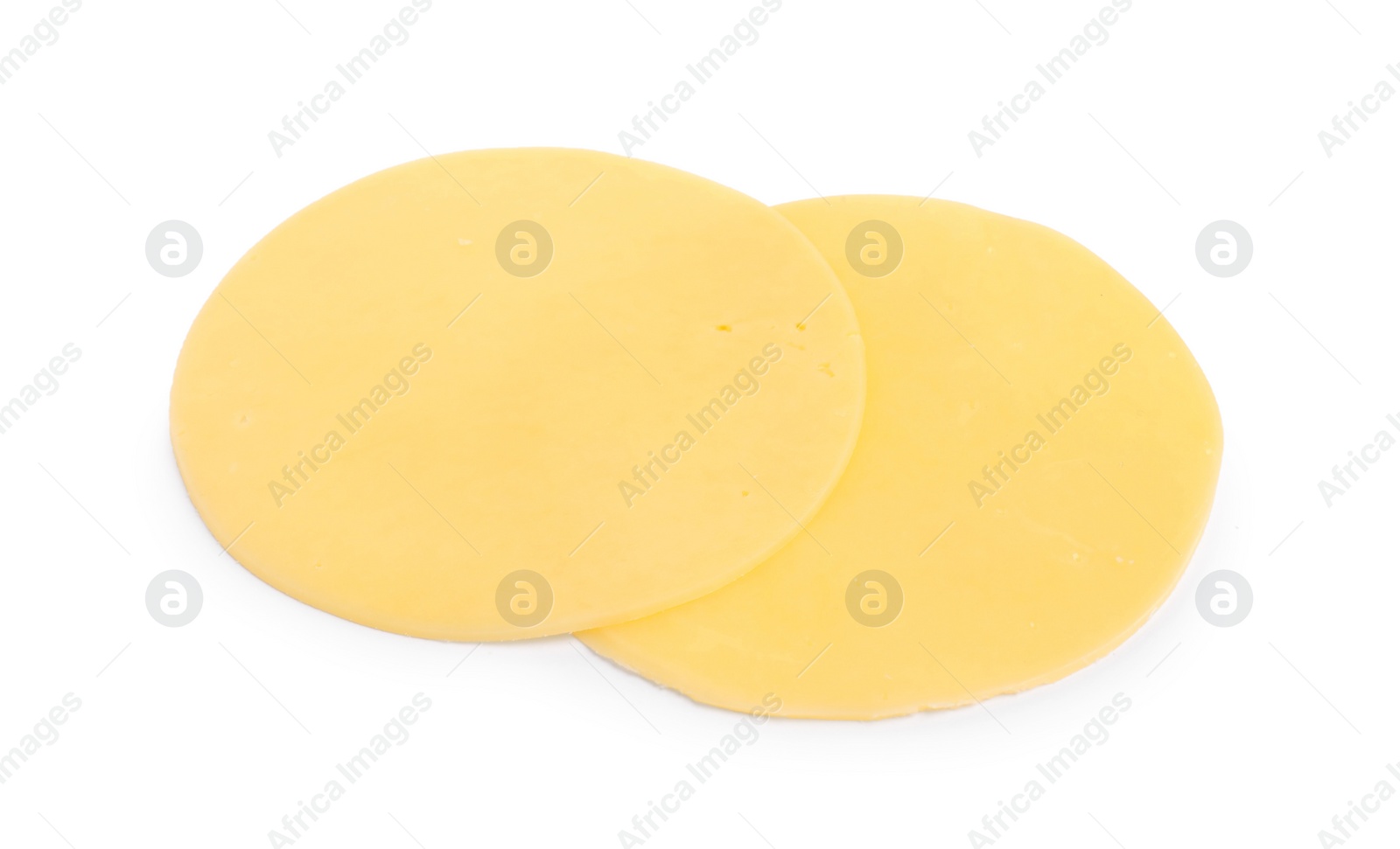 Photo of Slices of tasty fresh cheese isolated on white