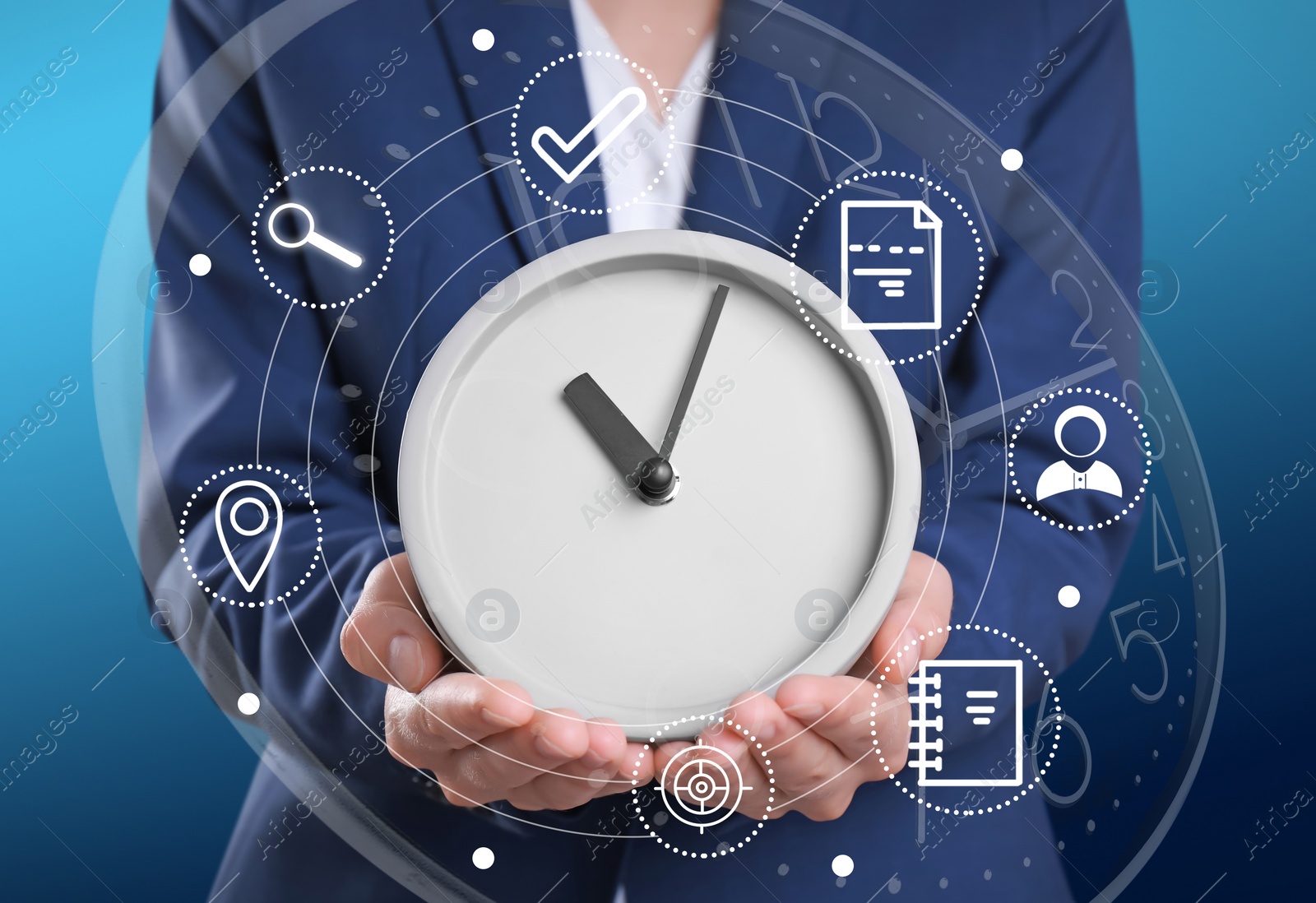 Image of Time management concept. Woman holding clock surrounded by icons, closeup