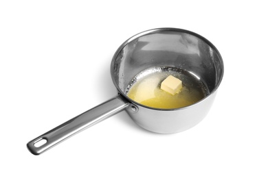 Photo of Saucepan with melting butter on white background