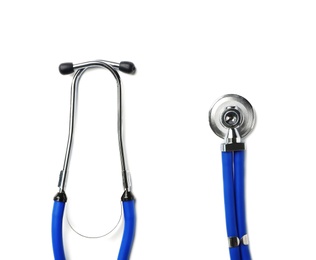Photo of Stethoscope for checking pulse on white background, top view. Space for text