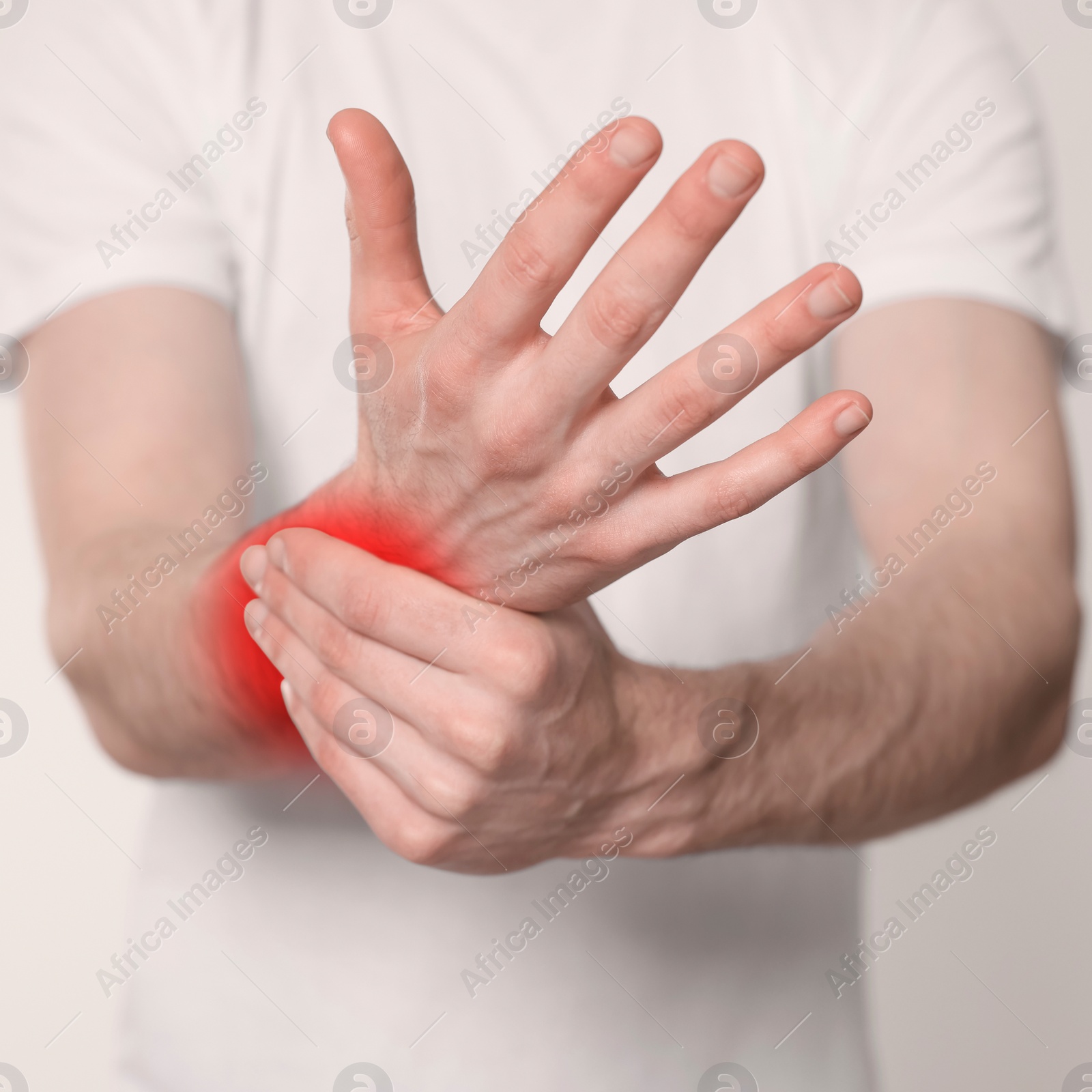 Image of Man suffering from rheumatism on light background, closeup