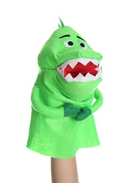 Photo of Dinosaur puppet for show on hand against white background