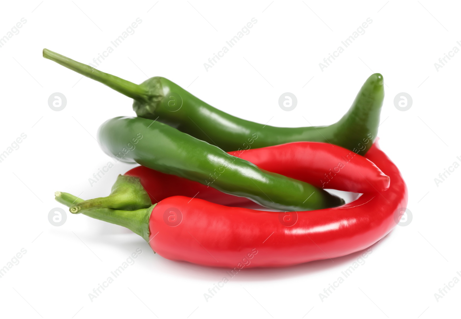 Photo of Ripe hot chili peppers on white background