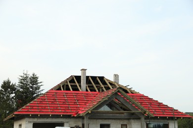 Photo of Roofhouse under construction against sky