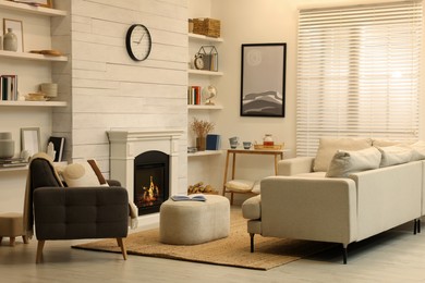 Photo of Stylish living room interior with comfortable sofa and decorative fireplace