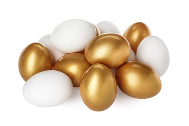 Photo of Golden eggs among ordinary ones on white background