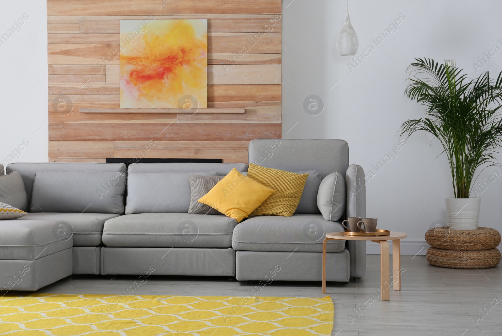 Photo of Stylish living room interior with comfortable couch