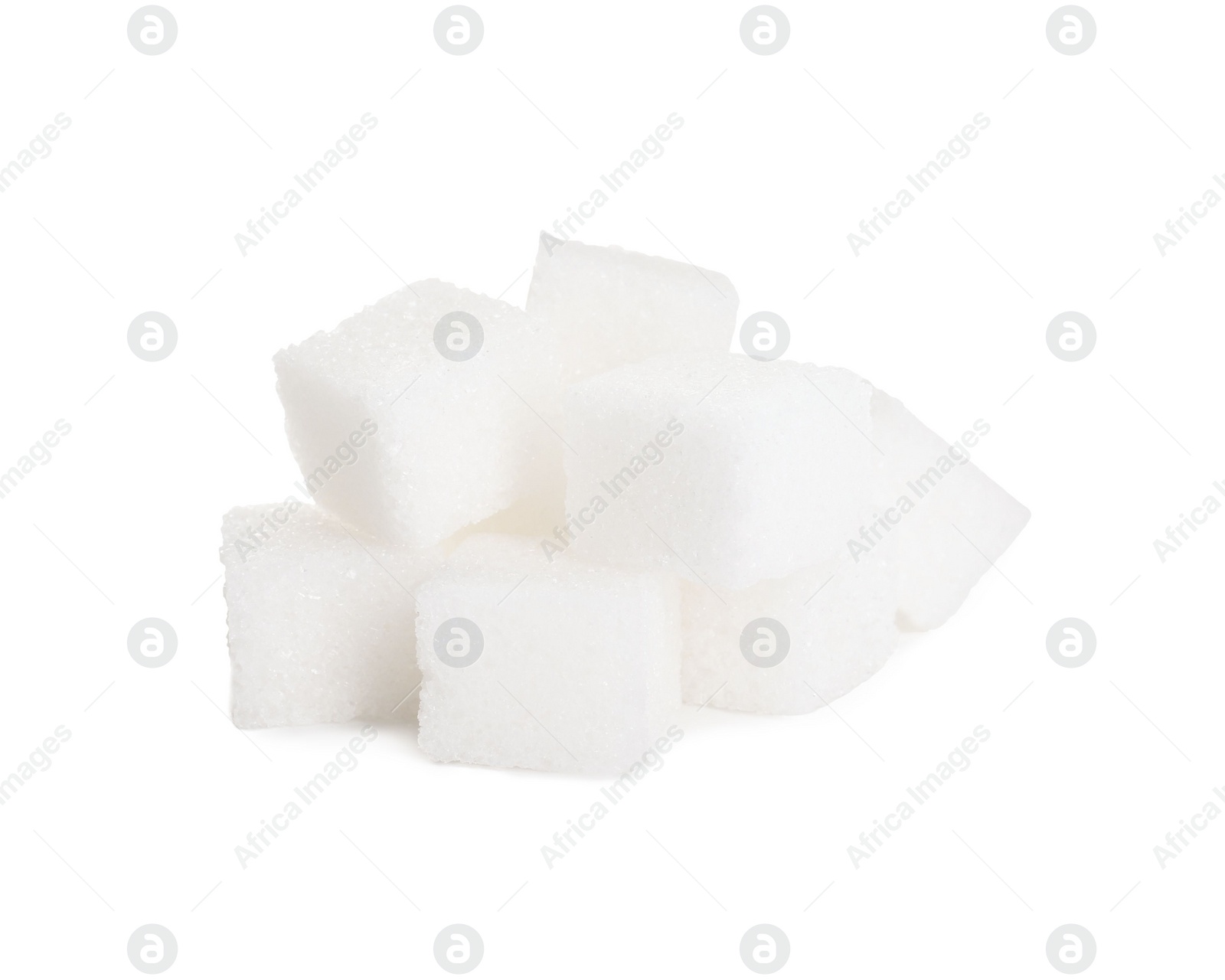 Photo of Pile of sugar cubes isolated on white