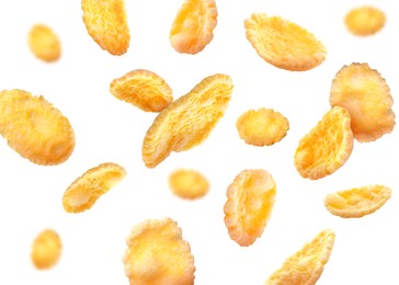 Image of Golden corn flakes falling on white background