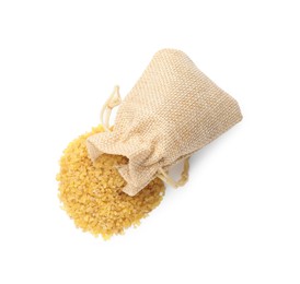 Photo of Burlap bag with raw bulgur isolated on white, top view