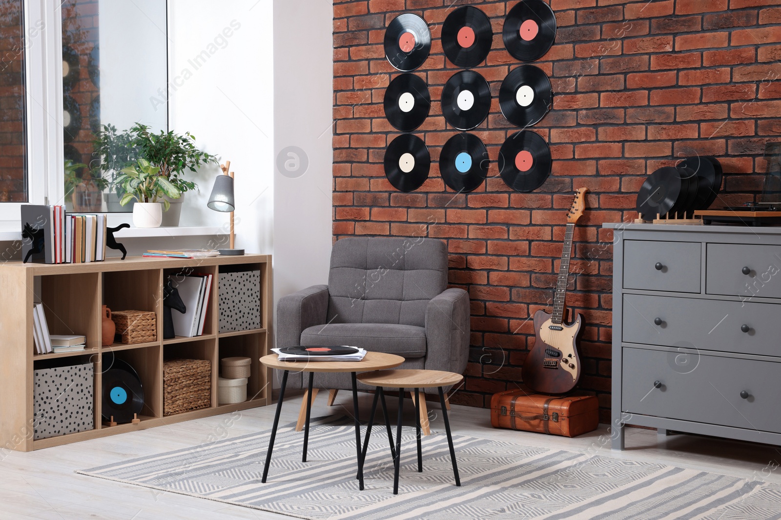 Photo of Living room decorated with vinyl records. Interior design