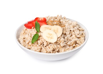 Photo of Tasty boiled oatmeal with strawberry, banana, peanut butter and chia seeds in bowl isolated on white