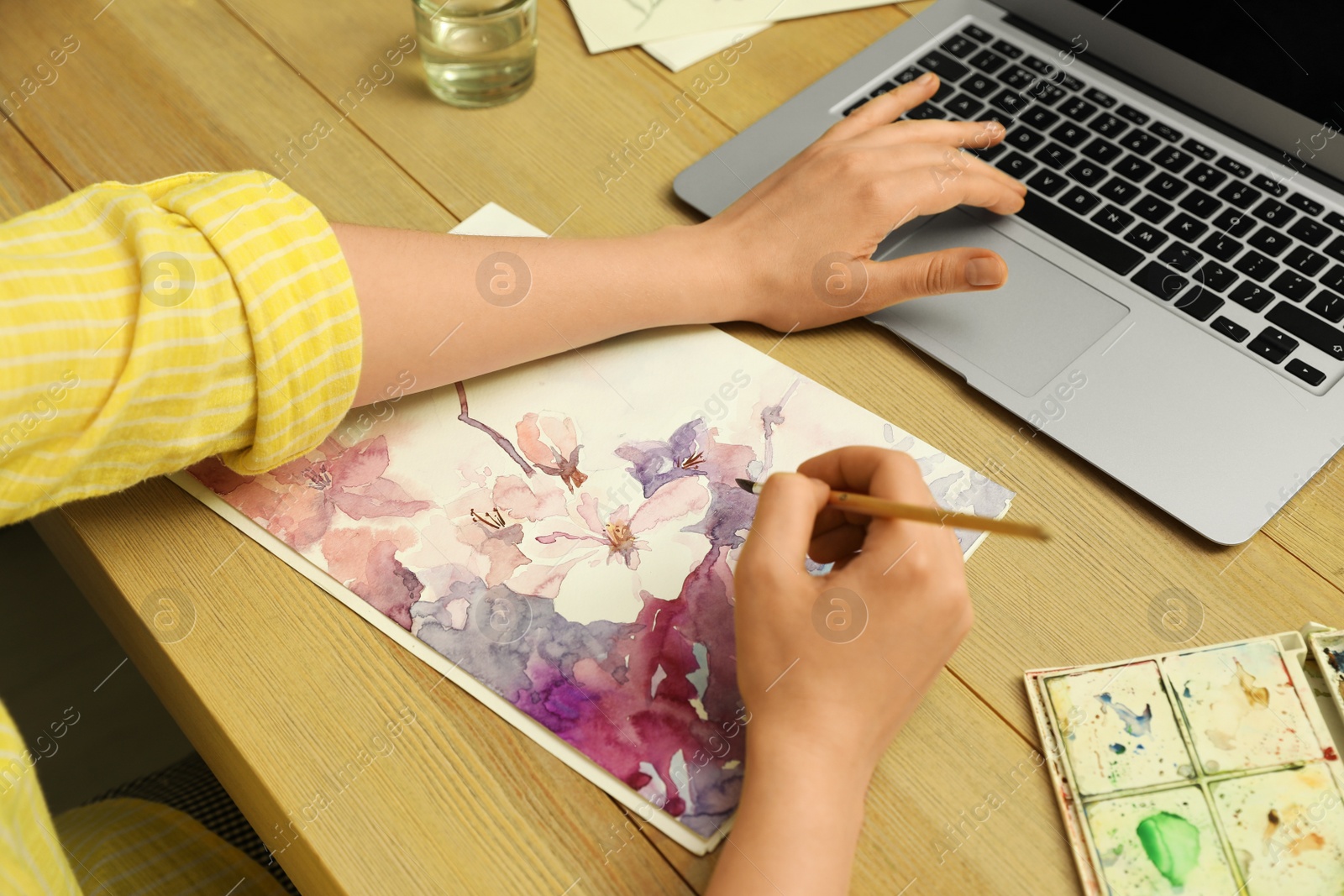 Photo of Woman drawing picture at online art lesson, closeup. Distant learning