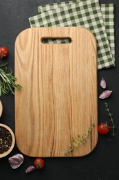 Photo of Cutting board, fresh tomatoes and different spices on grey textured table, flat lay