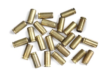 Photo of Cartridge cases isolated on white, top view. Firearm ammunition