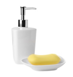 Photo of Soap bar and dispenser on white background
