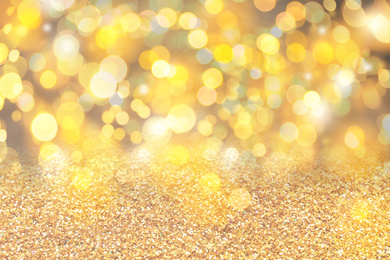 Image of Gold glitter with bokeh effect as abstract background