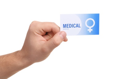 Photo of Man holding medical business card isolated on white, closeup. Women's health service