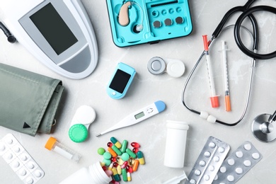 Photo of Flat lay composition with medical objects on grey background