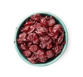 Photo of Dried cranberries in bowl isolated on white, top view