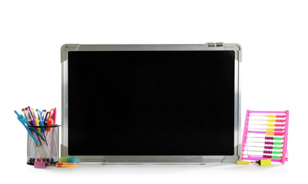 Photo of Small chalkboard and different school stationery on white background