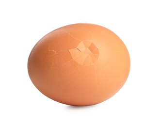 Photo of One cracked chicken egg isolated on white