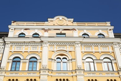 Photo of Beautiful facade of building on sunny day, low angle view