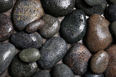 Photo of Composition with spa stones as background, top view