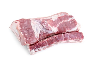 Photo of Pieces of raw pork belly isolated on white, top view