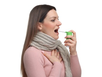 Photo of Woman using throat spray on white background