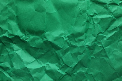 Photo of Sheet of color crumpled paper as background. Space for design