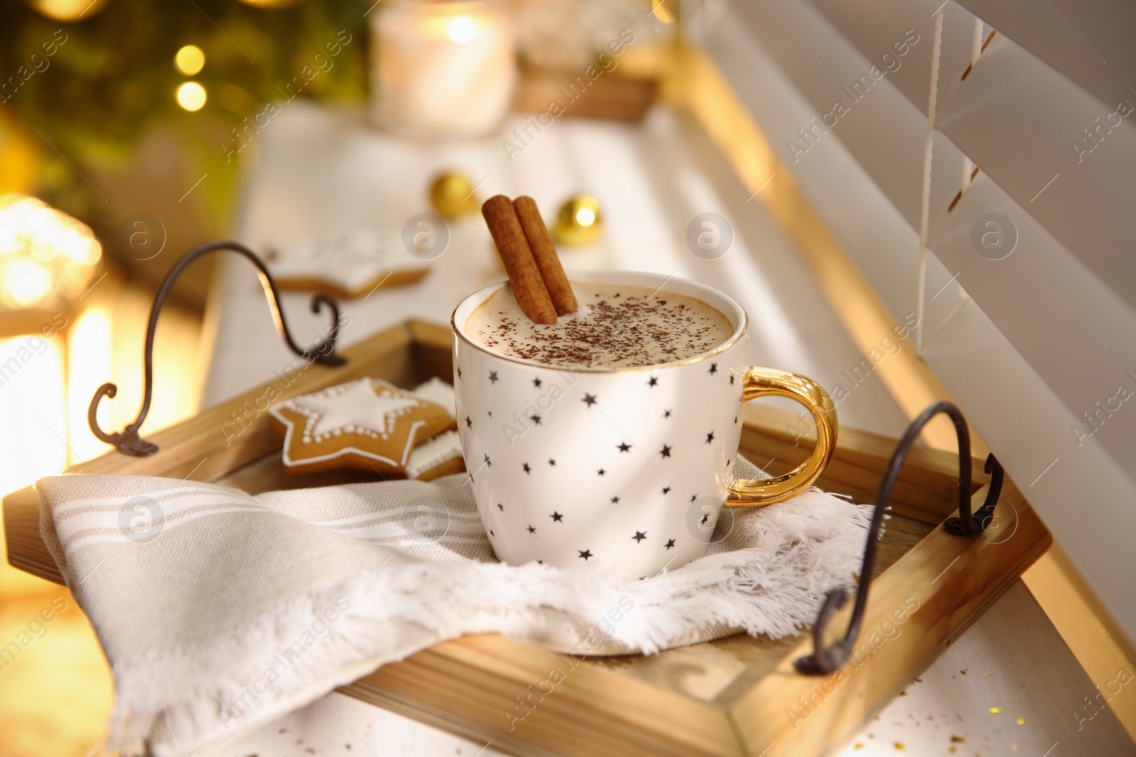 Photo of Composition with cup of hot drink on windowsill